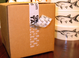 Tamper Evident tape - Security Tape. Tape that leaves behind a seal.